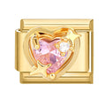 Eslabón dorado con corazón rosa y anillo orbital