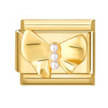Lazo dorado con perlas