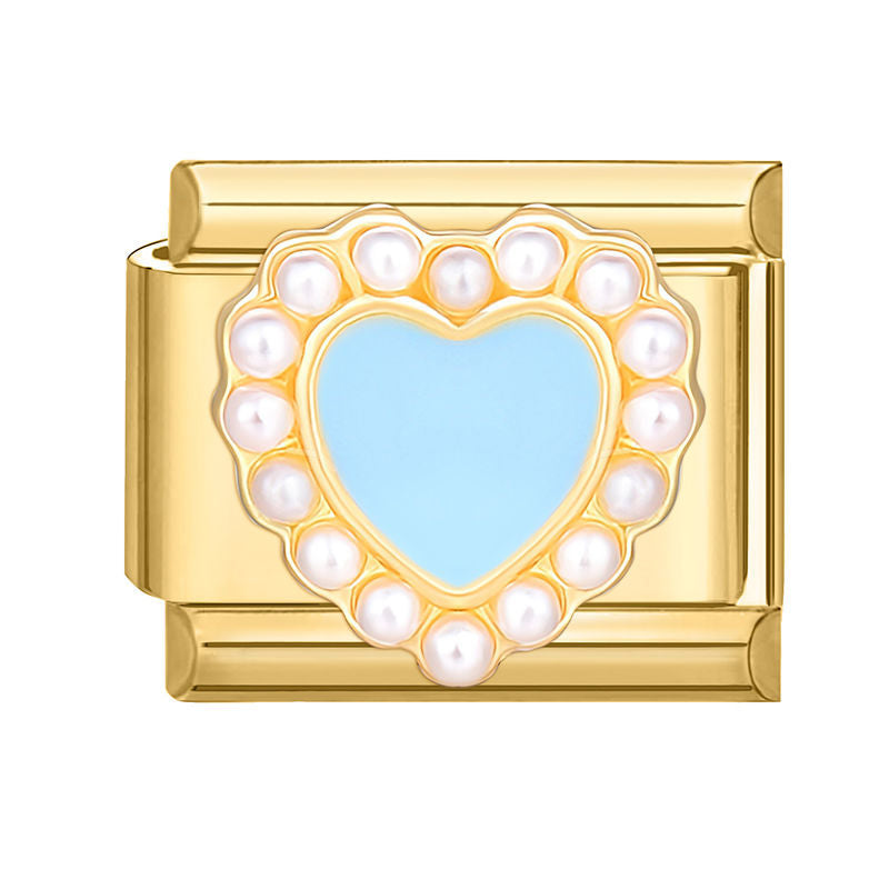 Corazón azul claro con perlas