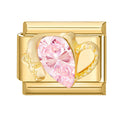 Corazón de manos doradas con circonita rosa