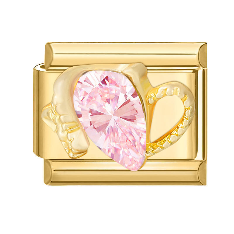Corazón de manos doradas con circonita rosa
