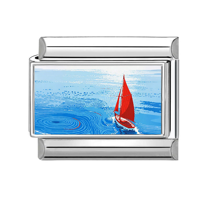 Velero rojo en el mar