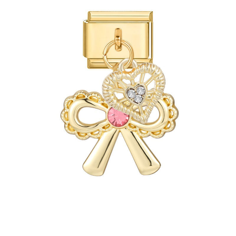 Colgante lazo dorado con piedra rosa y corazón de circonitas
