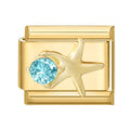 Estrella de mar dorada con circonita turquesa
