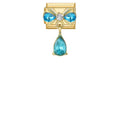 Charm dorado con piedras azules y colgante de gota turquesa