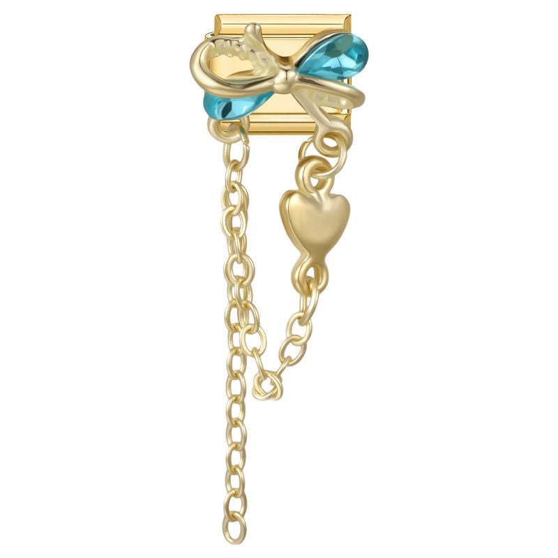 Lazo dorado con piedras azules, cadena y corazón colgante