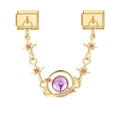 Cadena doble con planeta lila y estrellas rosas