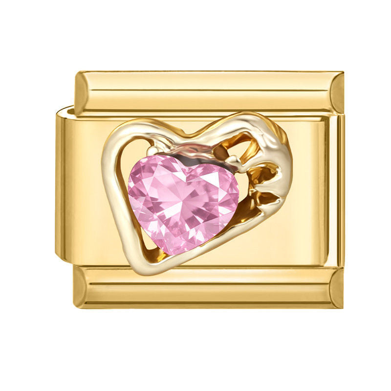 Corazón dorado con circonita rosa