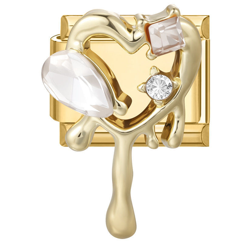Corazón dorado derretido con piedras y circonita