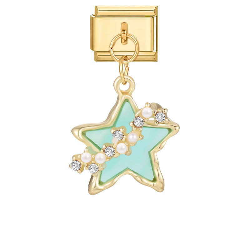 Estrella verde con perlas y circonitas