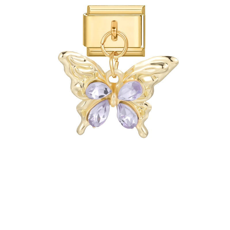 Mariposa dorada con piedras lilas
