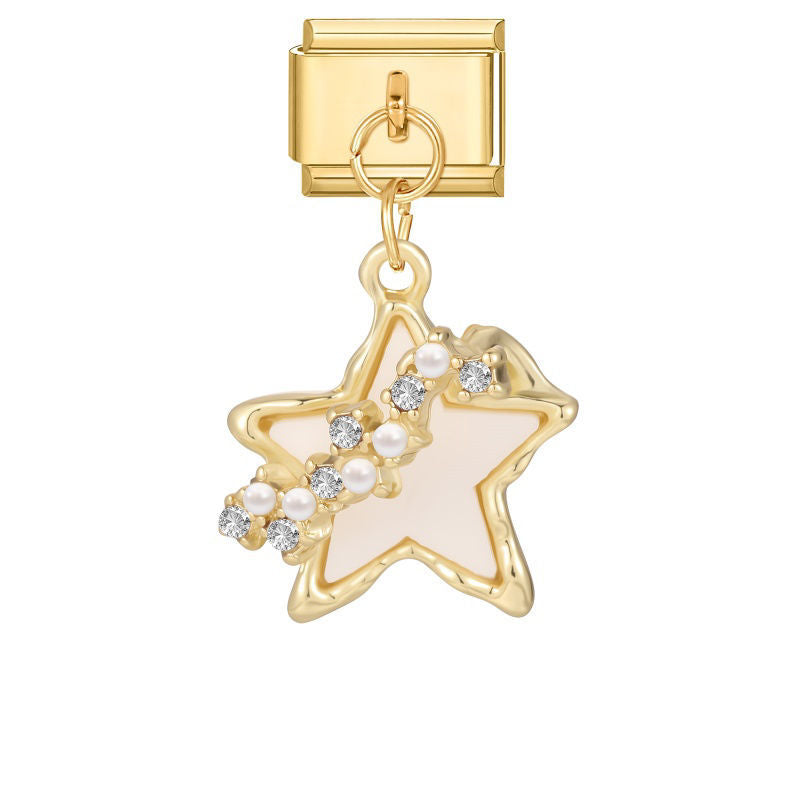 Estrella dorada con perla nácar, perlas y circonitas