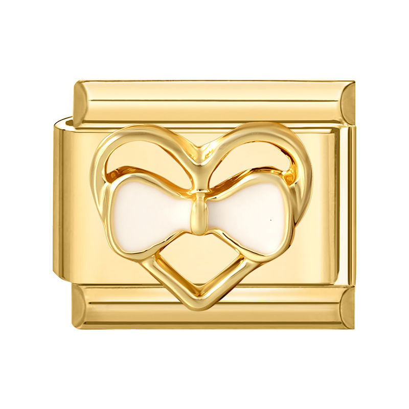 Corazón dorado con lazo blanco
