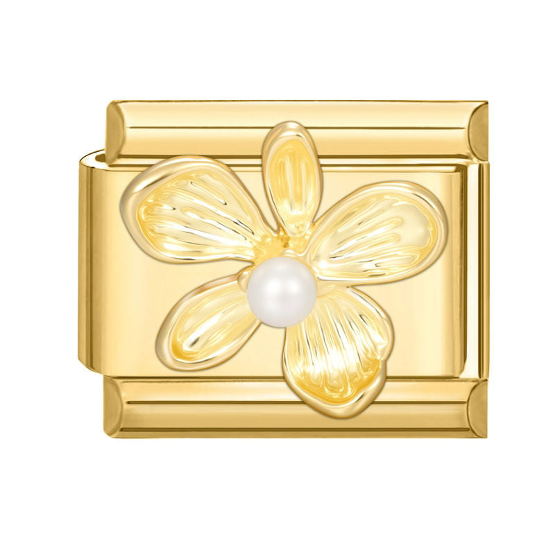 Flor dorada con perla
