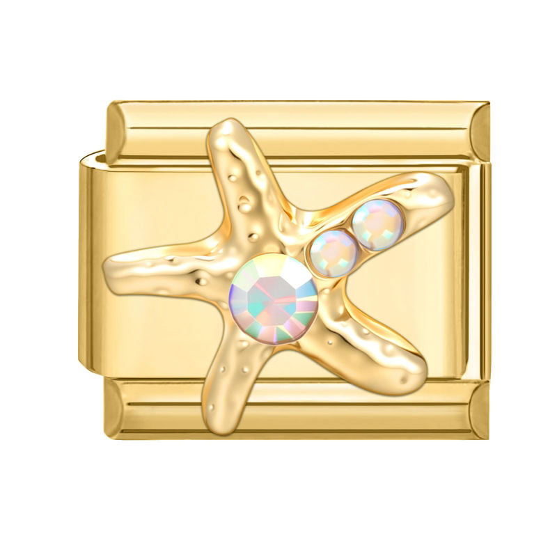 Estrella de mar dorada con circonitas irisadas