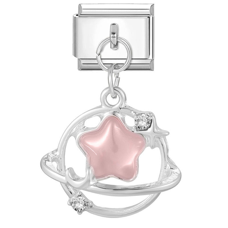 Estrella rosa con anillo y circonitas
