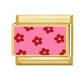 Estampado de flores rojas sobre fondo rosa