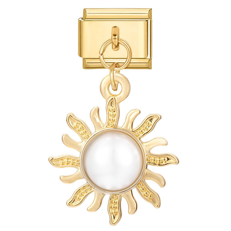 Sol dorado con perla blanca