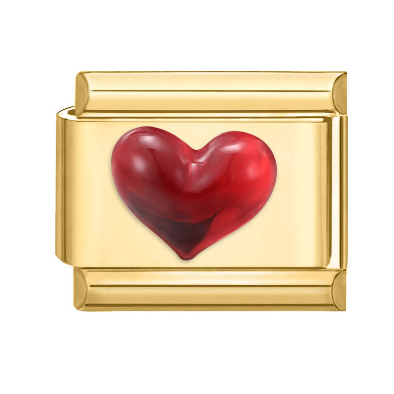 Corazón rojo sobre fondo dorado